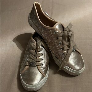 bebe Women's gold Metallic Sneakers